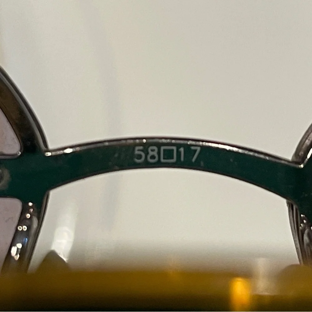 Coach Gold and Gray Sunglasses Rimless Design